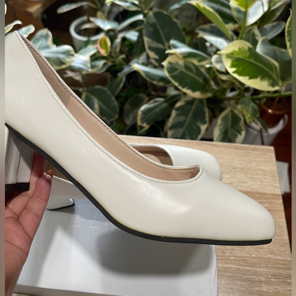 Brand new white stack heels.